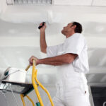 Conquering the Climb: Essential Tips for Painting High Ceilings Safely and Efficiently